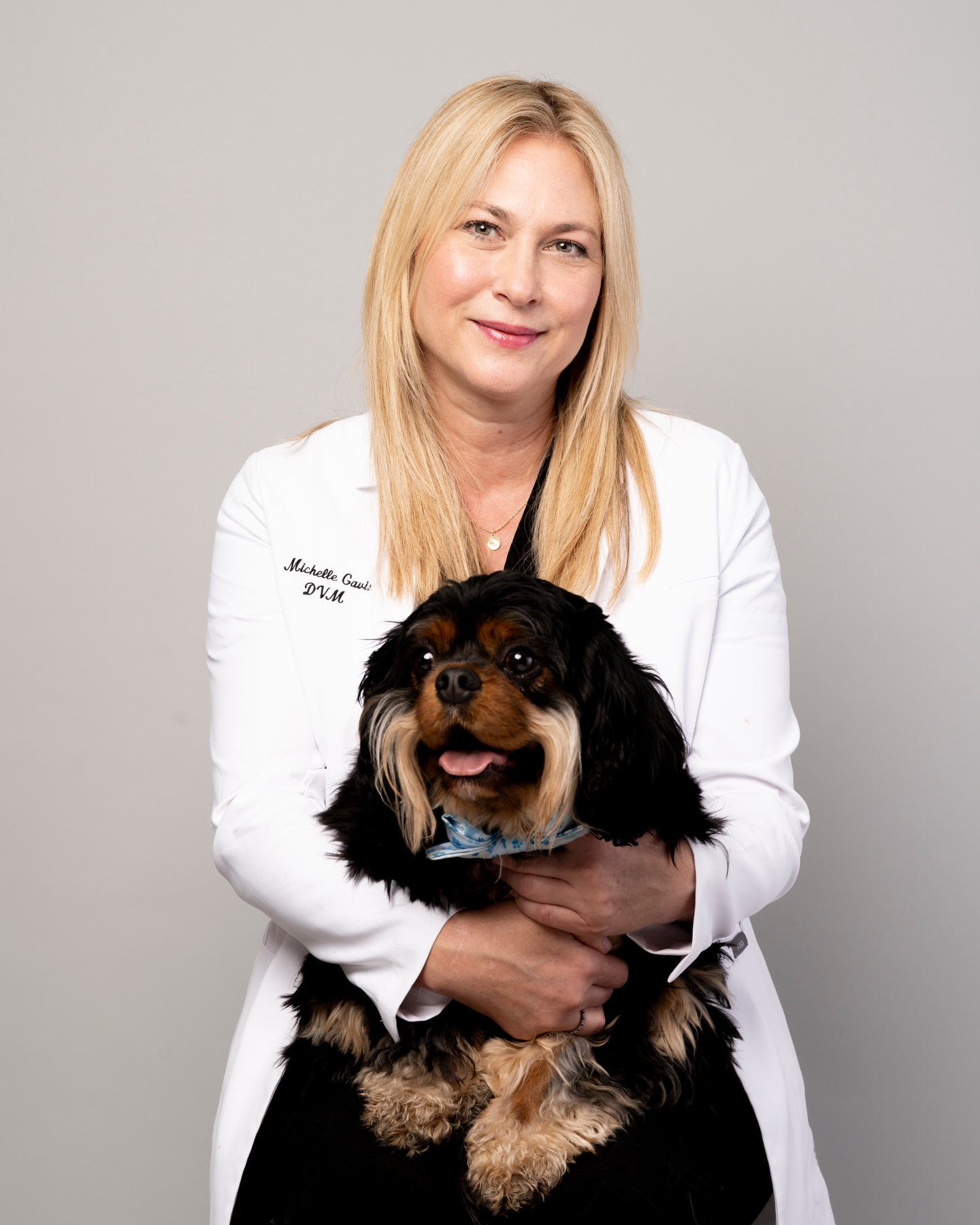 Dr. Caren with a Cavalier King Charles Spaniel